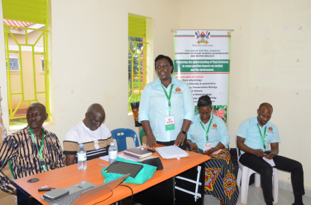 Dr. Patience Tugume (standing), the project’s Principal Investigator addressing the workshop participants on the key research findings.